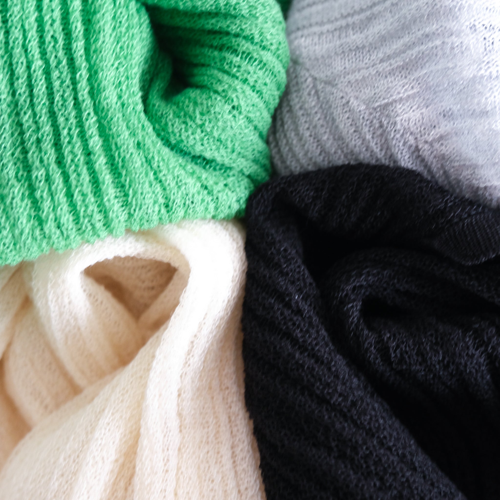 LightシアーランダムRIBショートカーデ