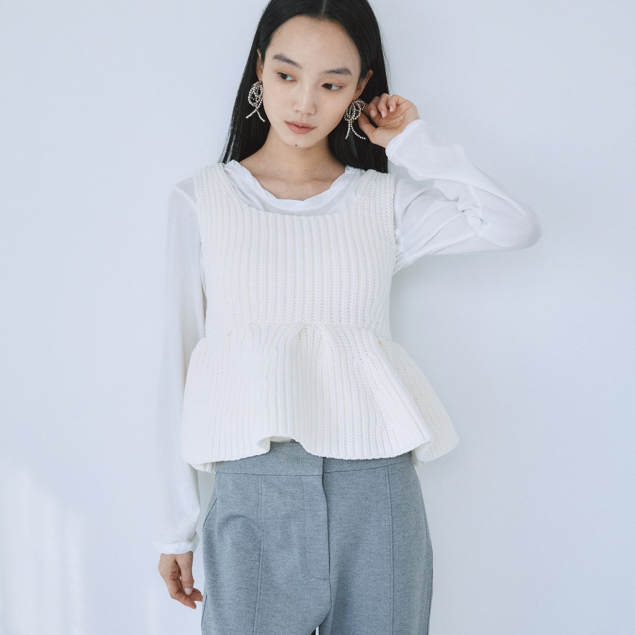 ハイストレッチペプラムニットトップス