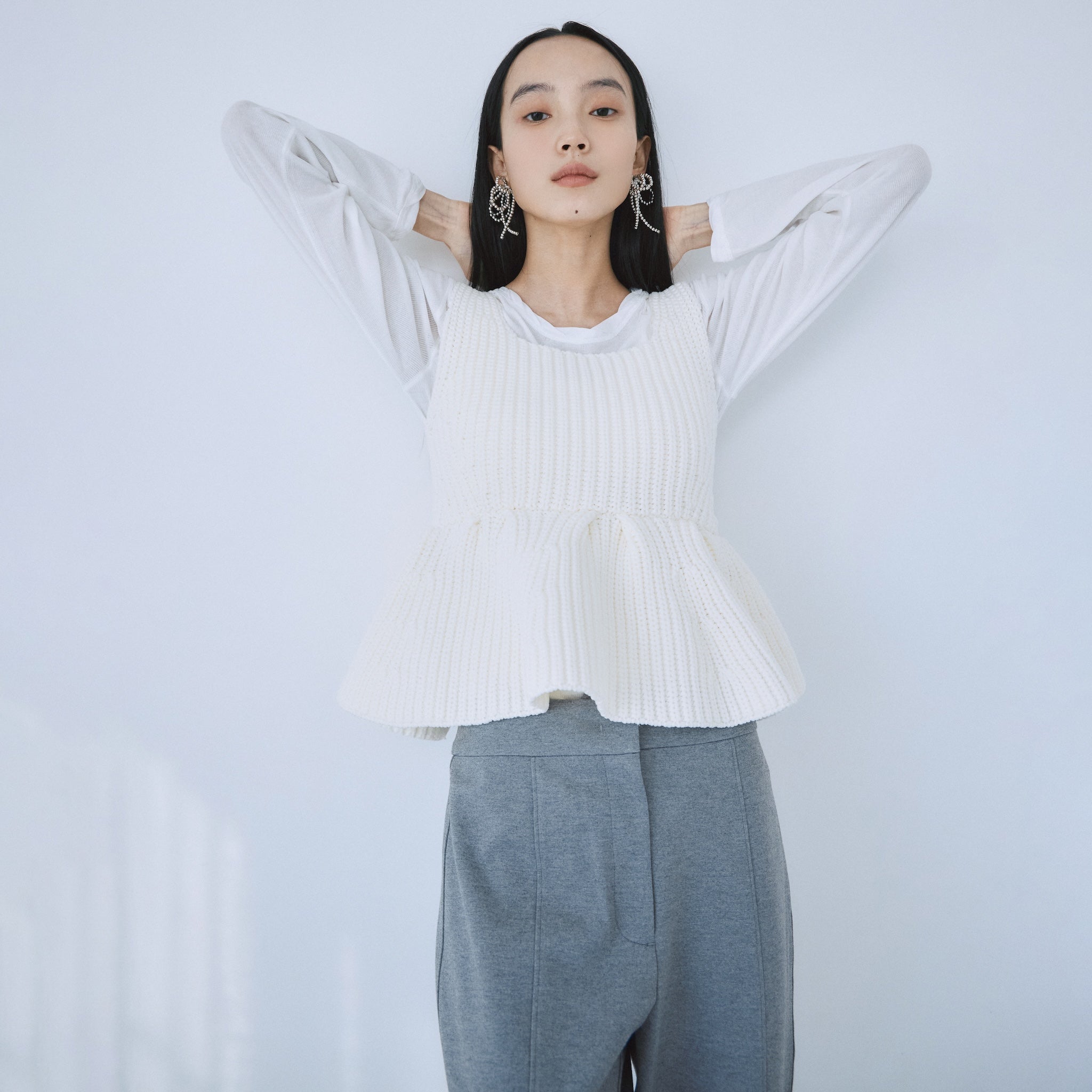 ハイストレッチペプラムニットトップス