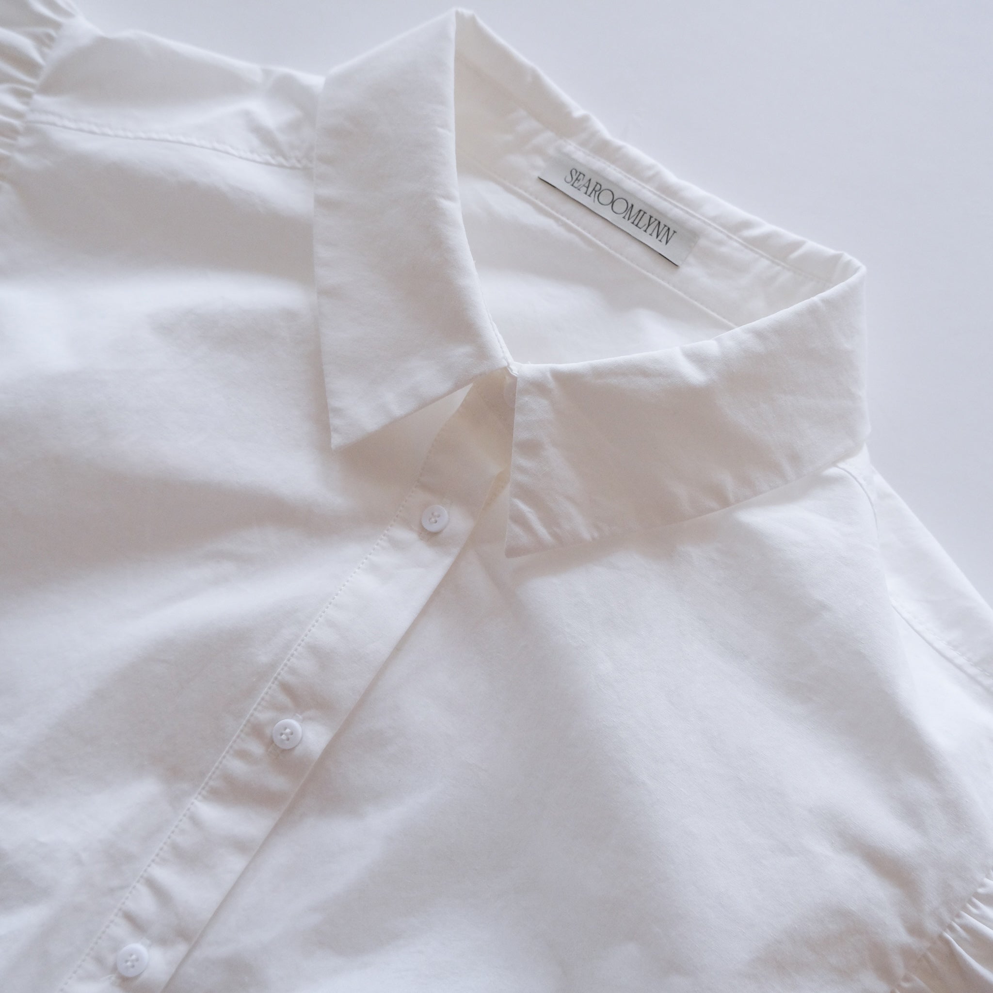 Frill Sleeveラウンドヘムシャツ