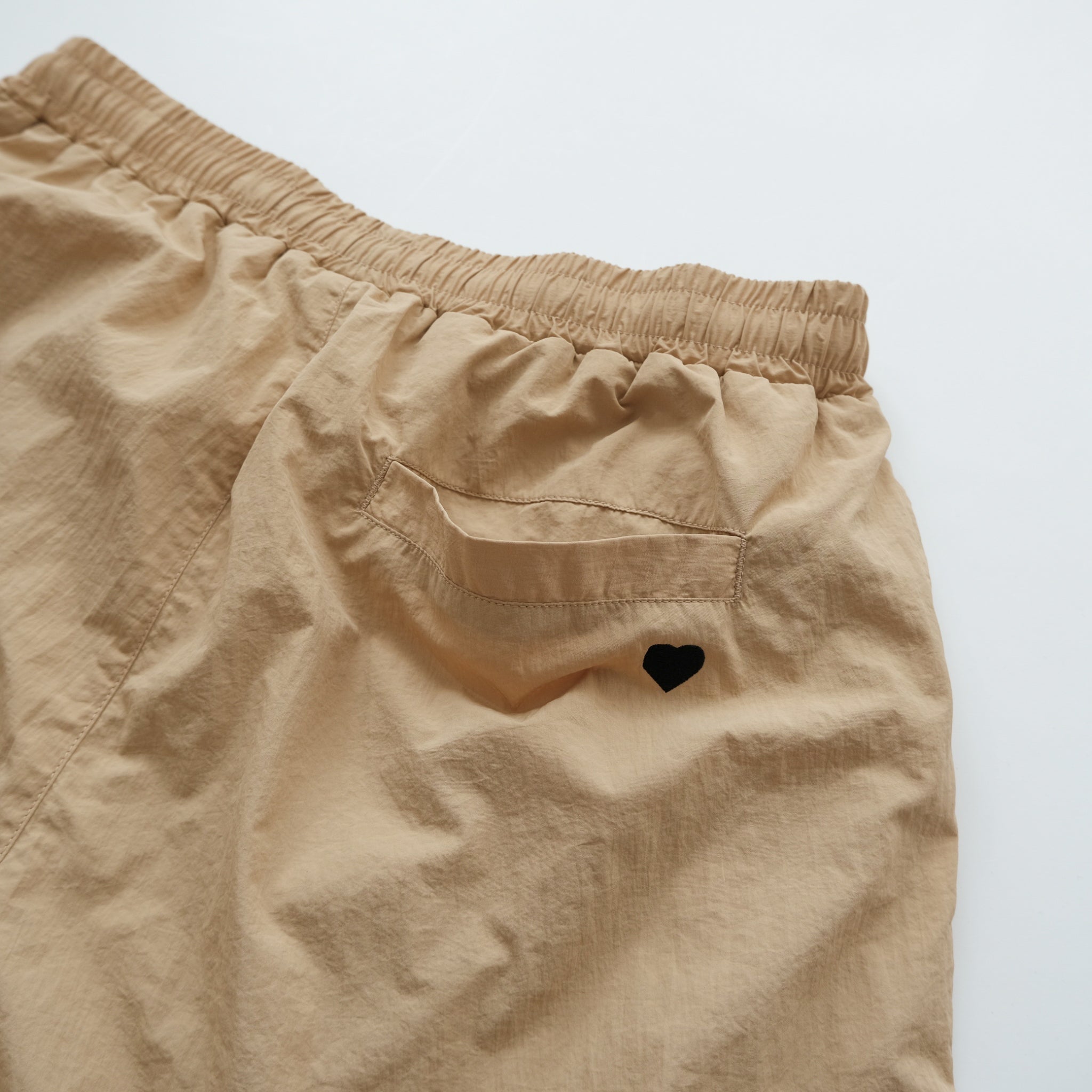 UMBRO x SRL ナイロントラックパンツ