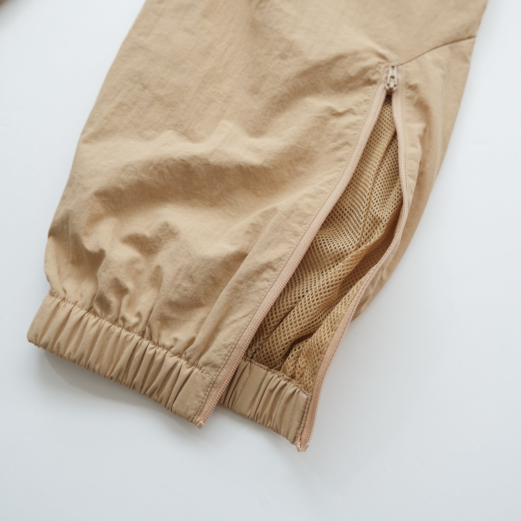 UMBRO x SRL ナイロントラックパンツ