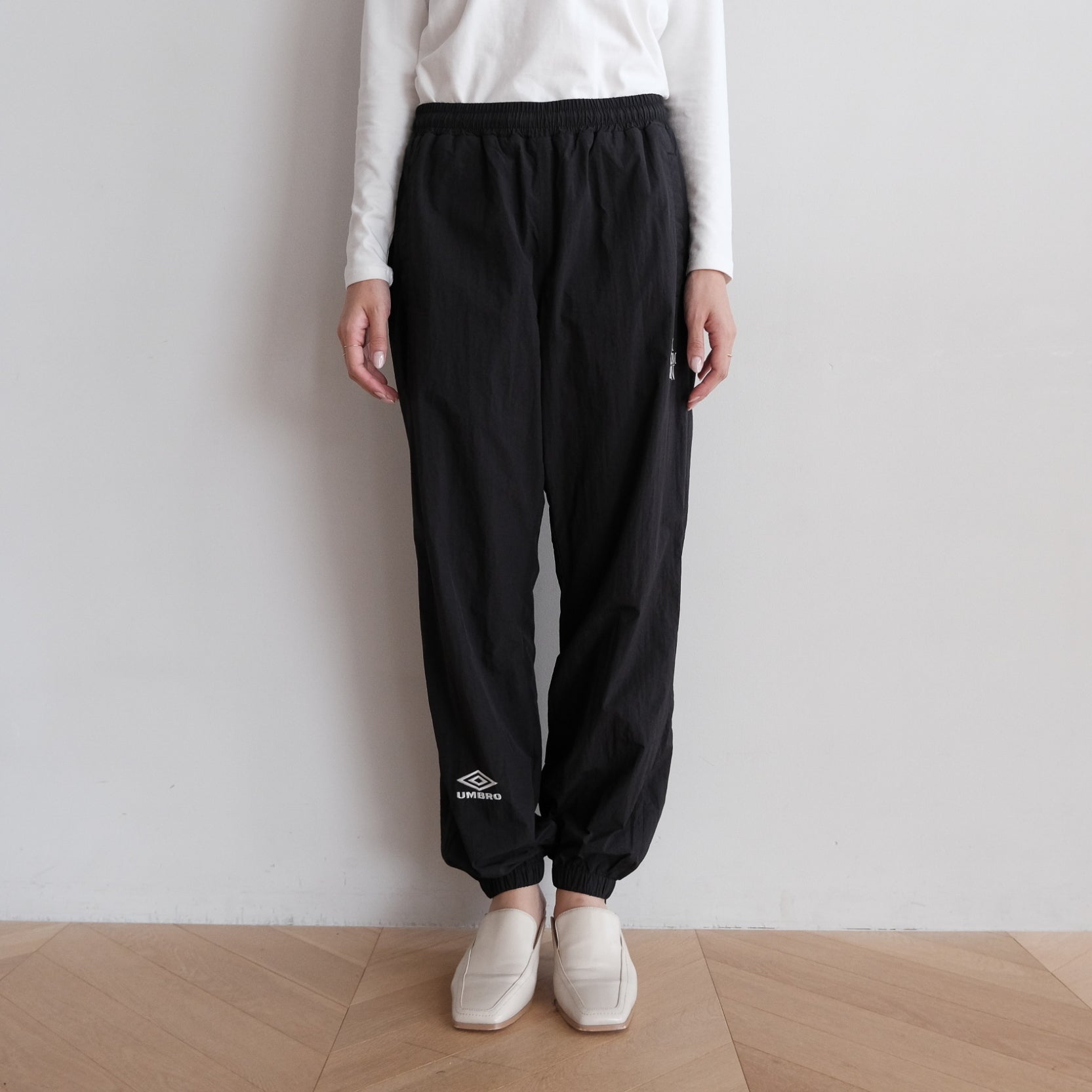 UMBRO x SRL ナイロントラックパンツ