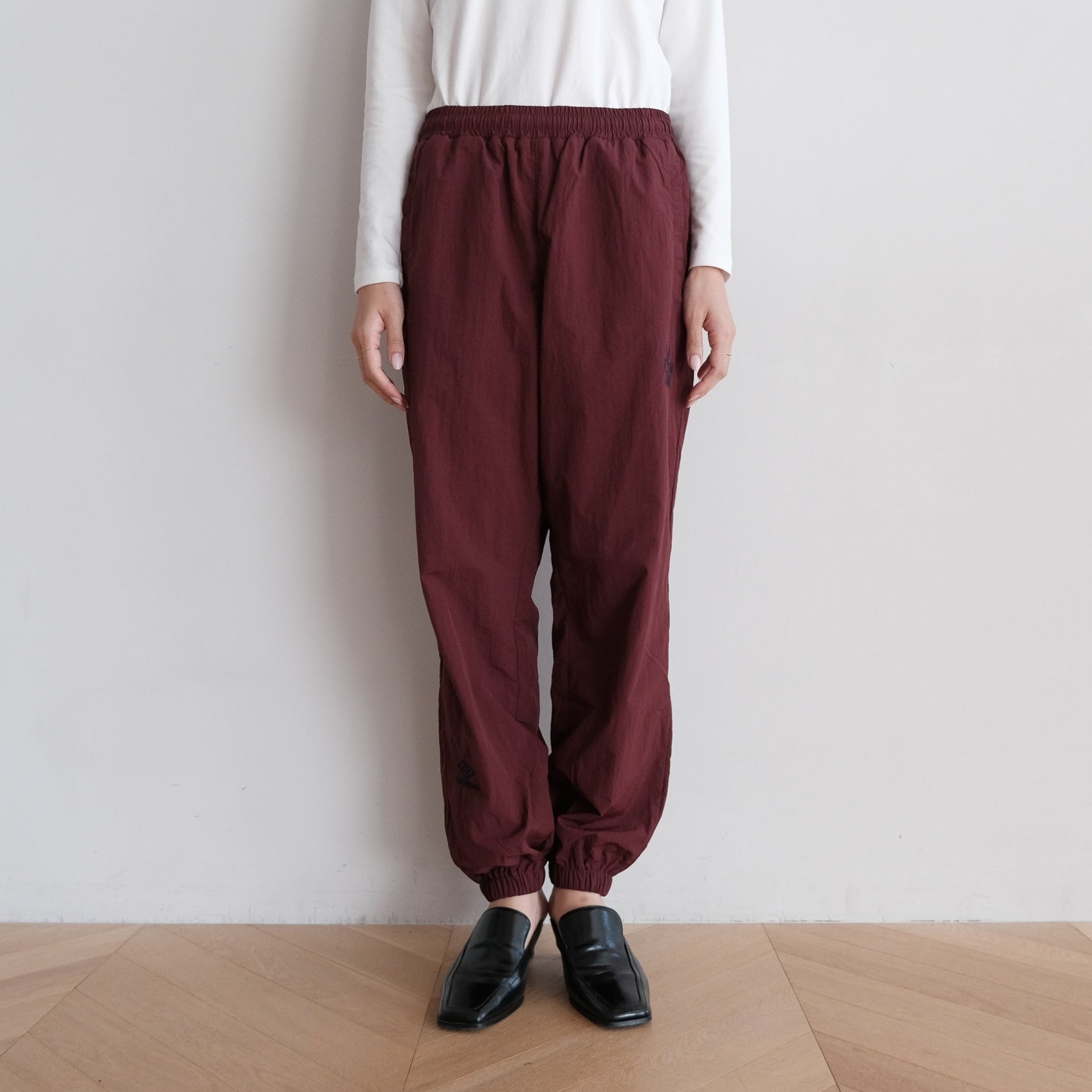 UMBRO x SRL ナイロントラックパンツ