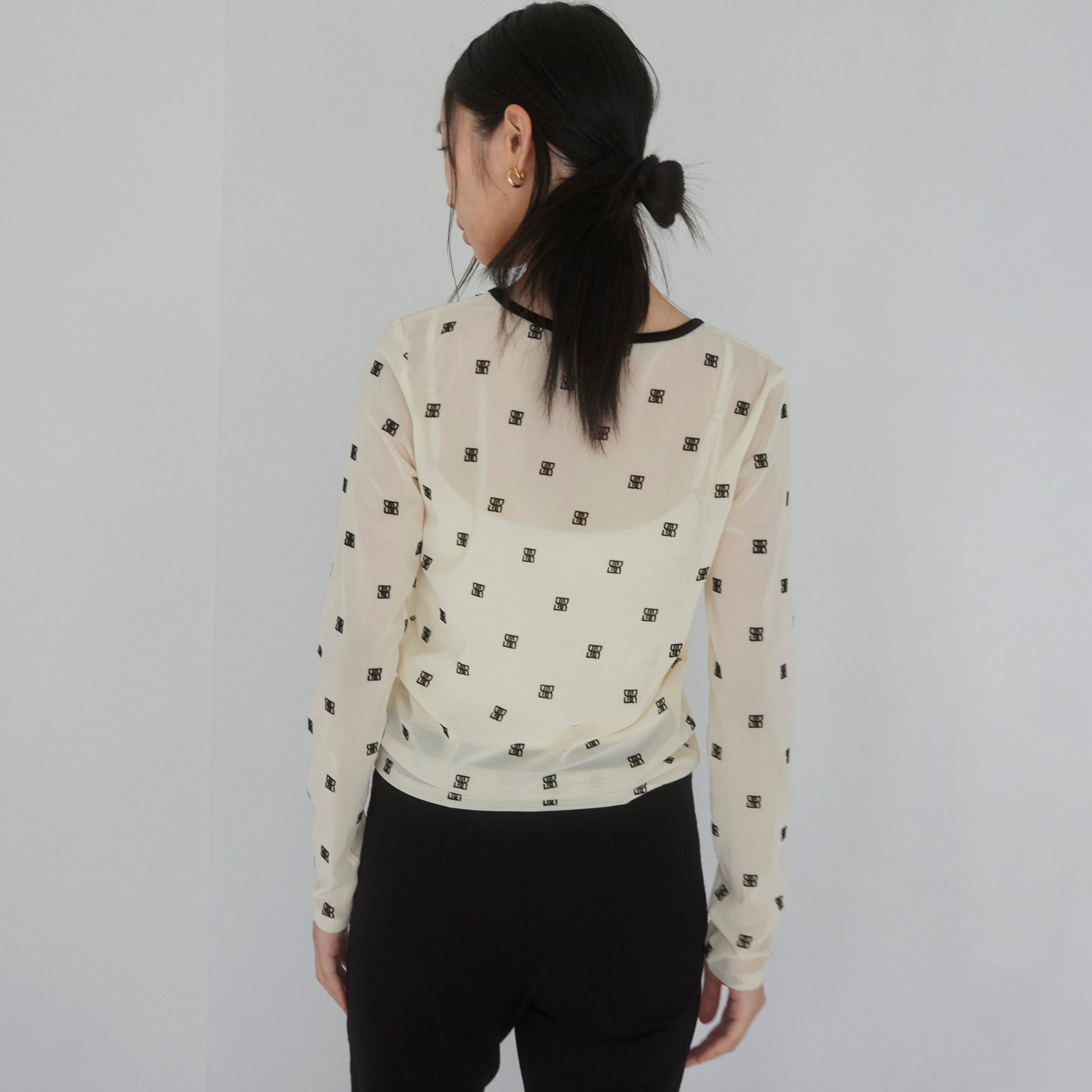 Flocked Multi Pattern Crew Neck Top