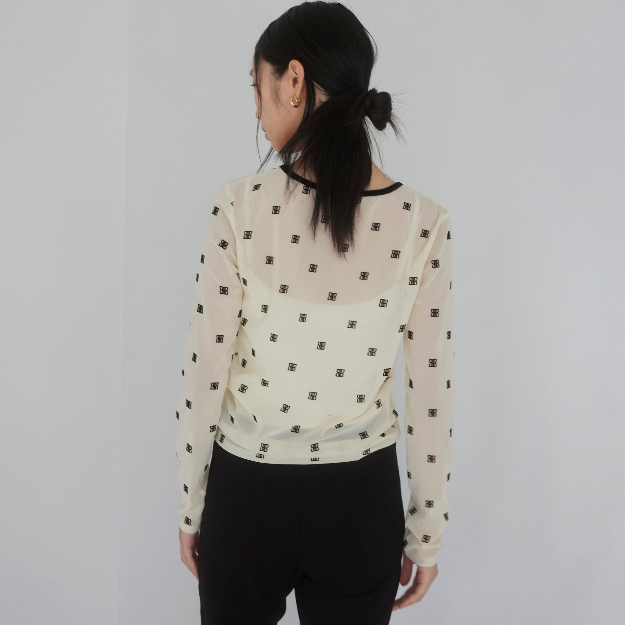 Flocked Multi Pattern Crew Neck Top