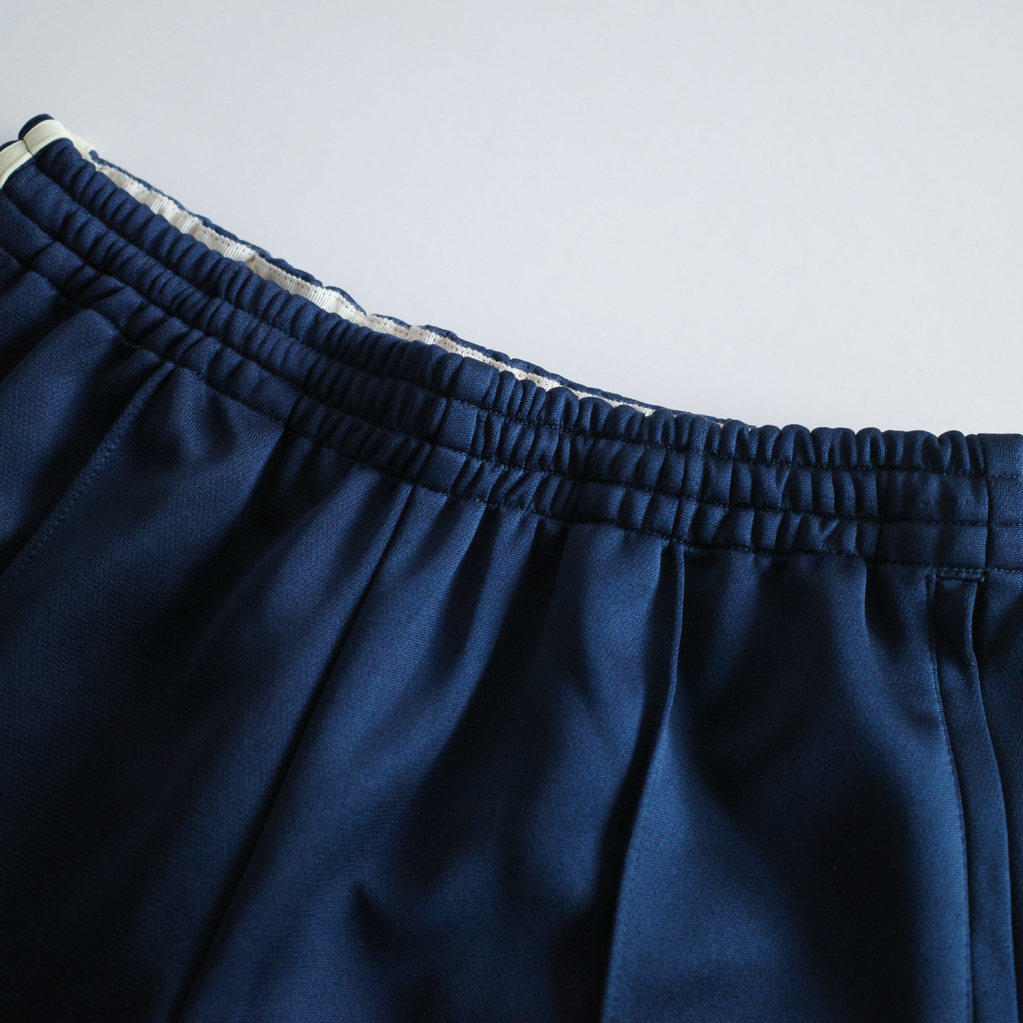 collab Asymmetry Line Trackpants