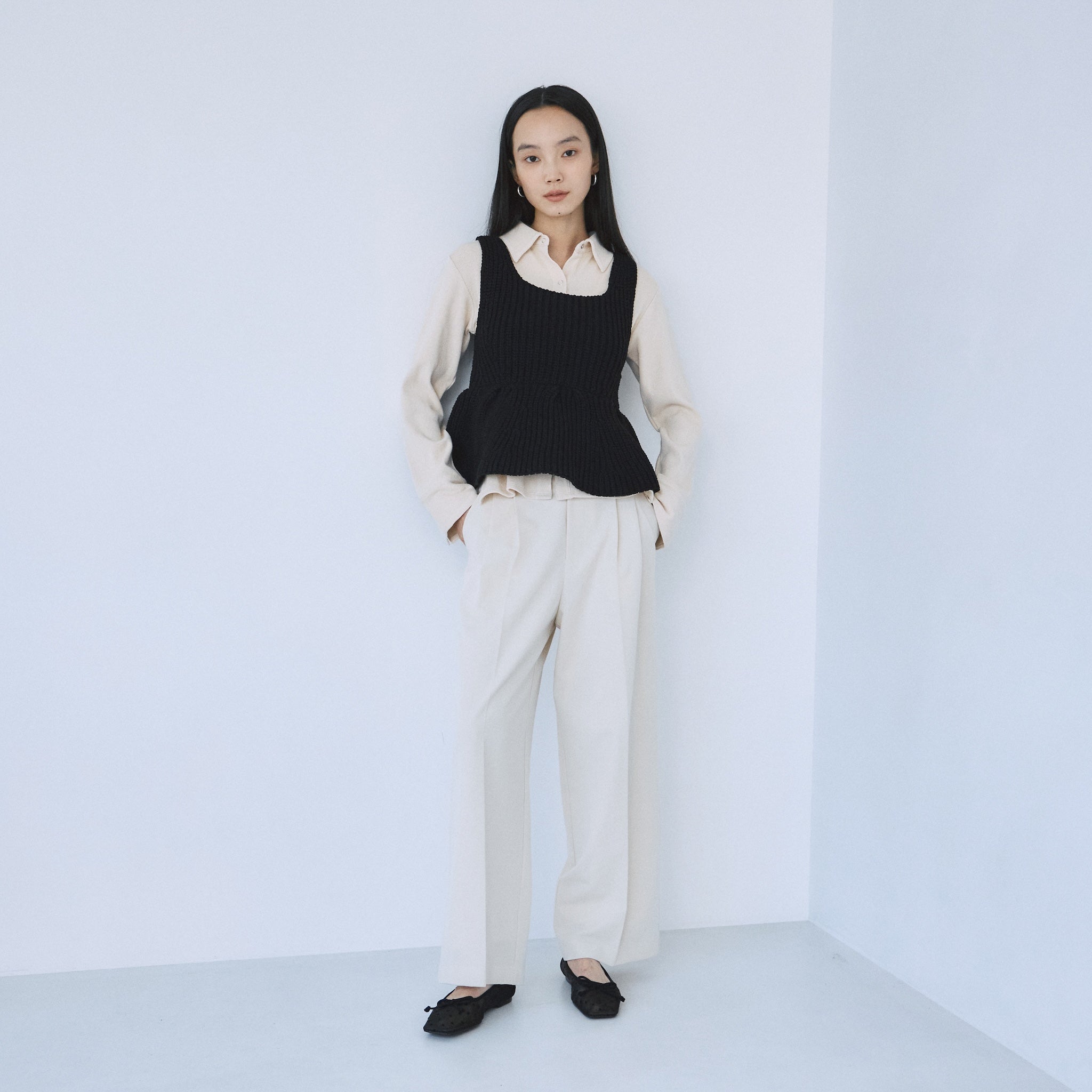 ハイストレッチペプラムニットトップス