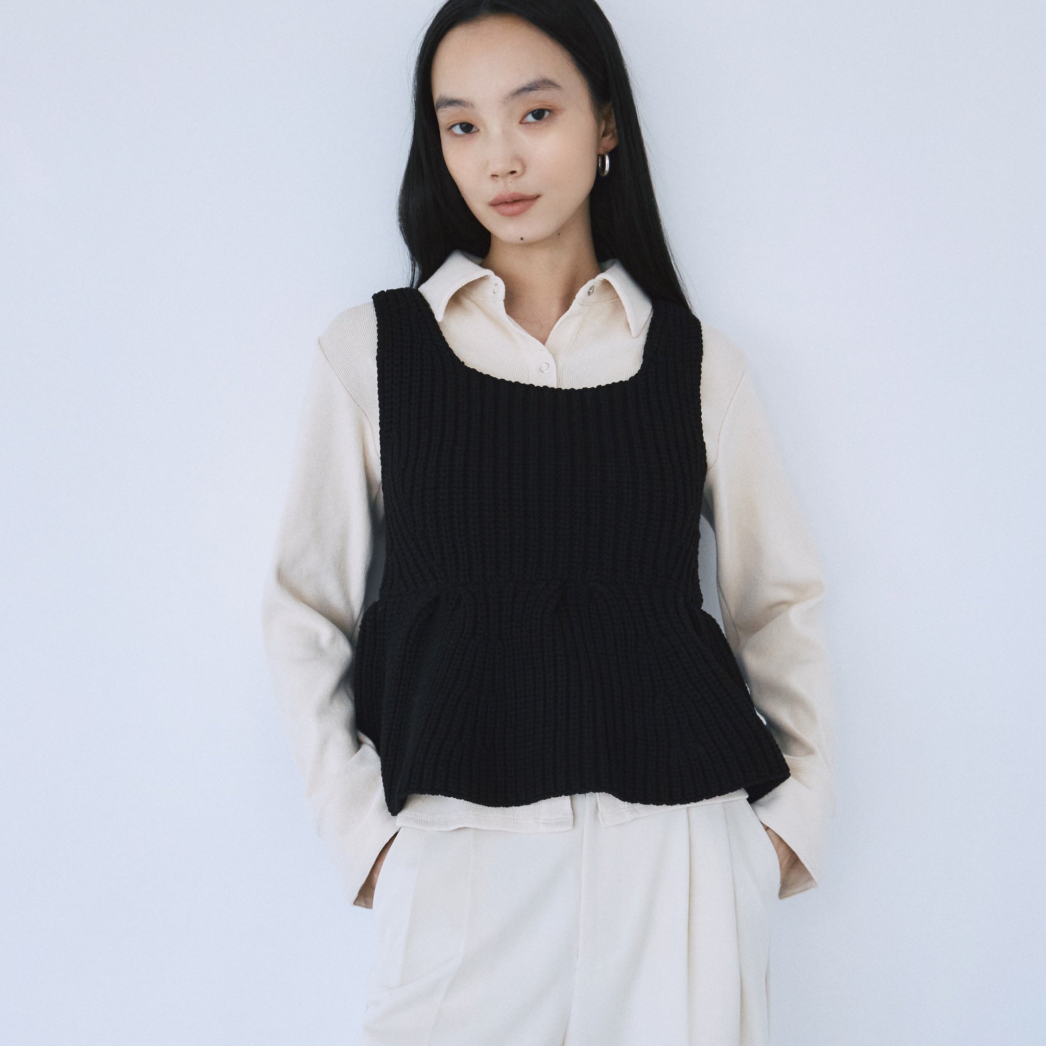 ハイストレッチペプラムニットトップス