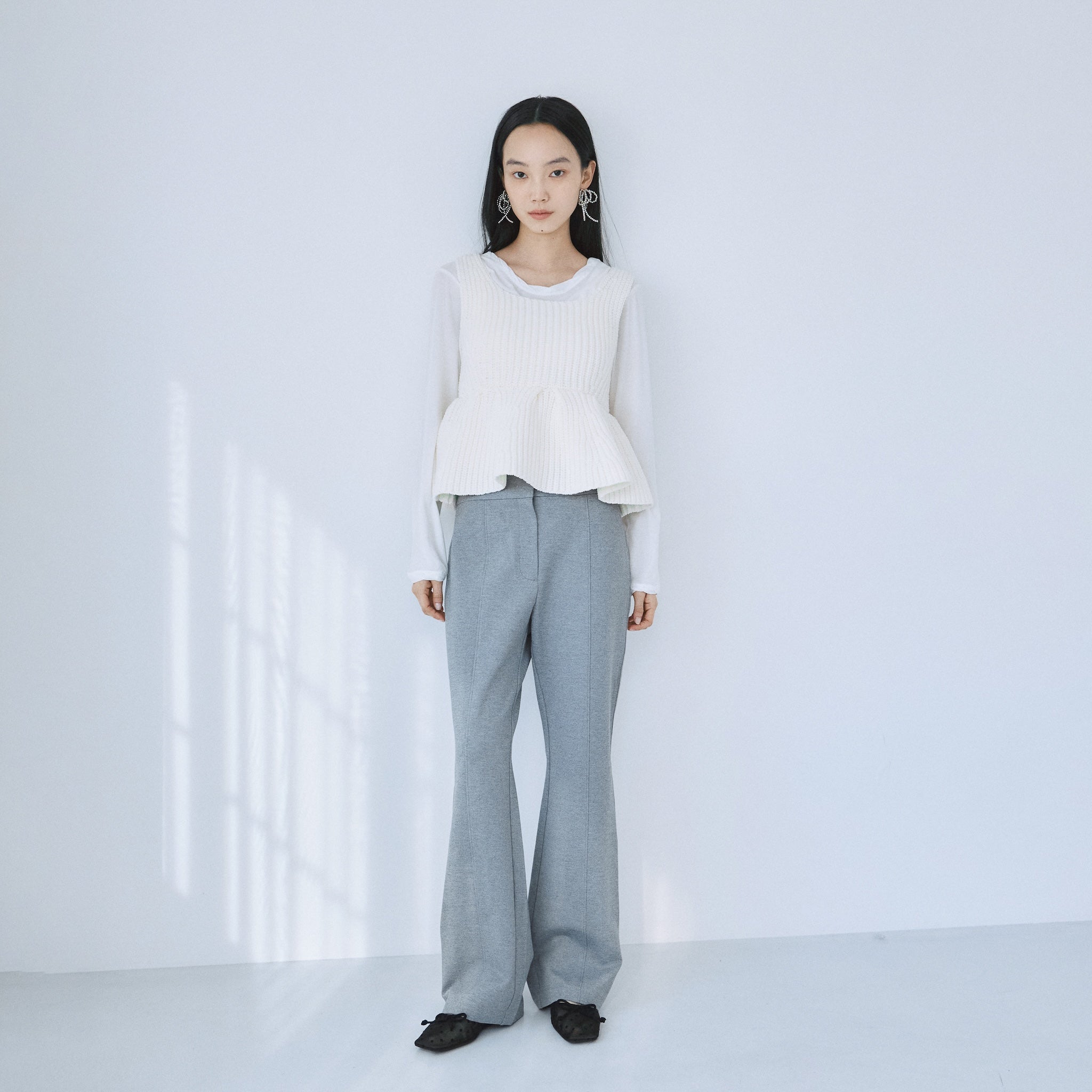 ハイストレッチペプラムニットトップス