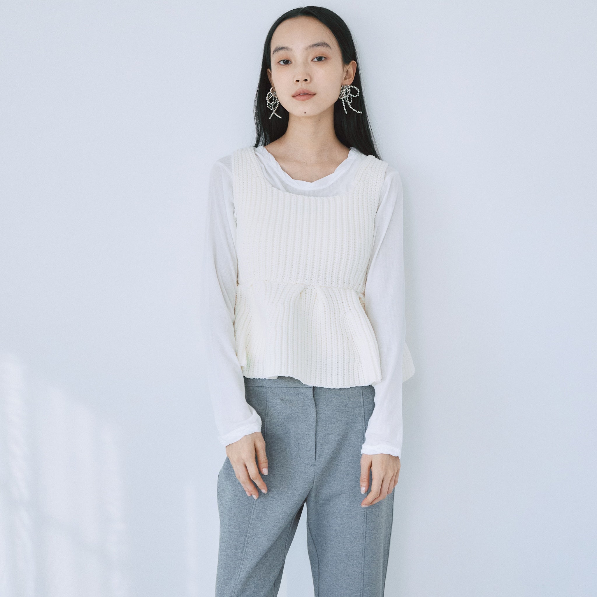 ハイストレッチペプラムニットトップス