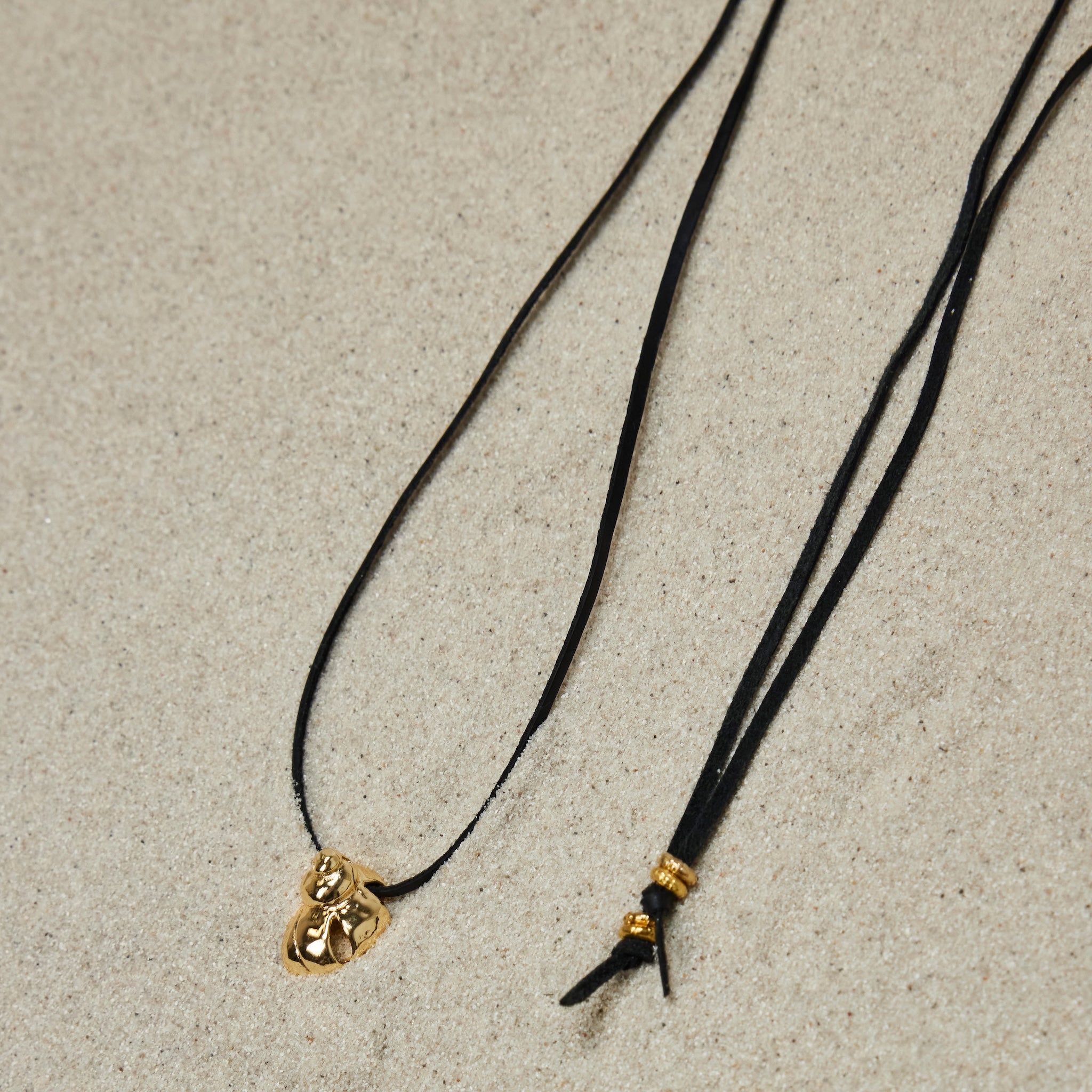 Shell silk cord necklace