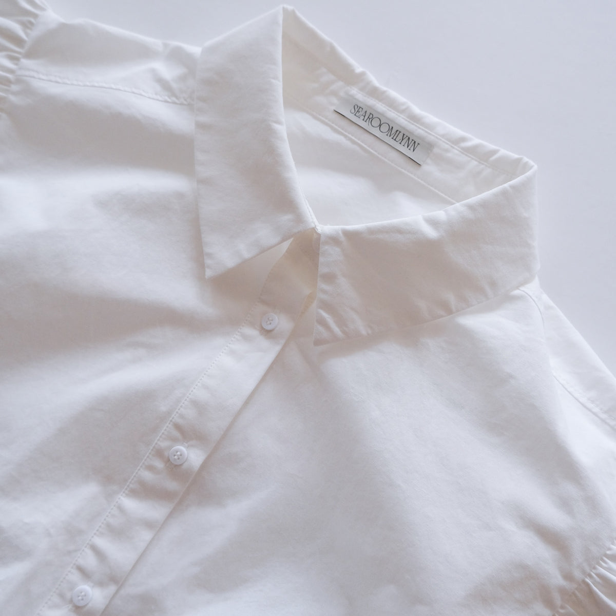 Frill Sleeveラウンドヘムシャツ