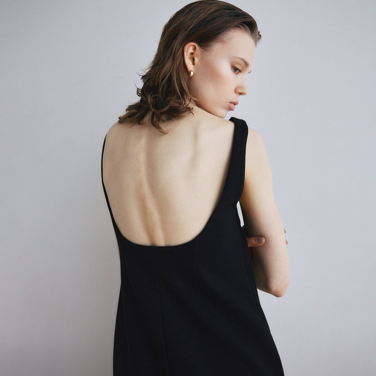 Pad-in back-open boat neck dress