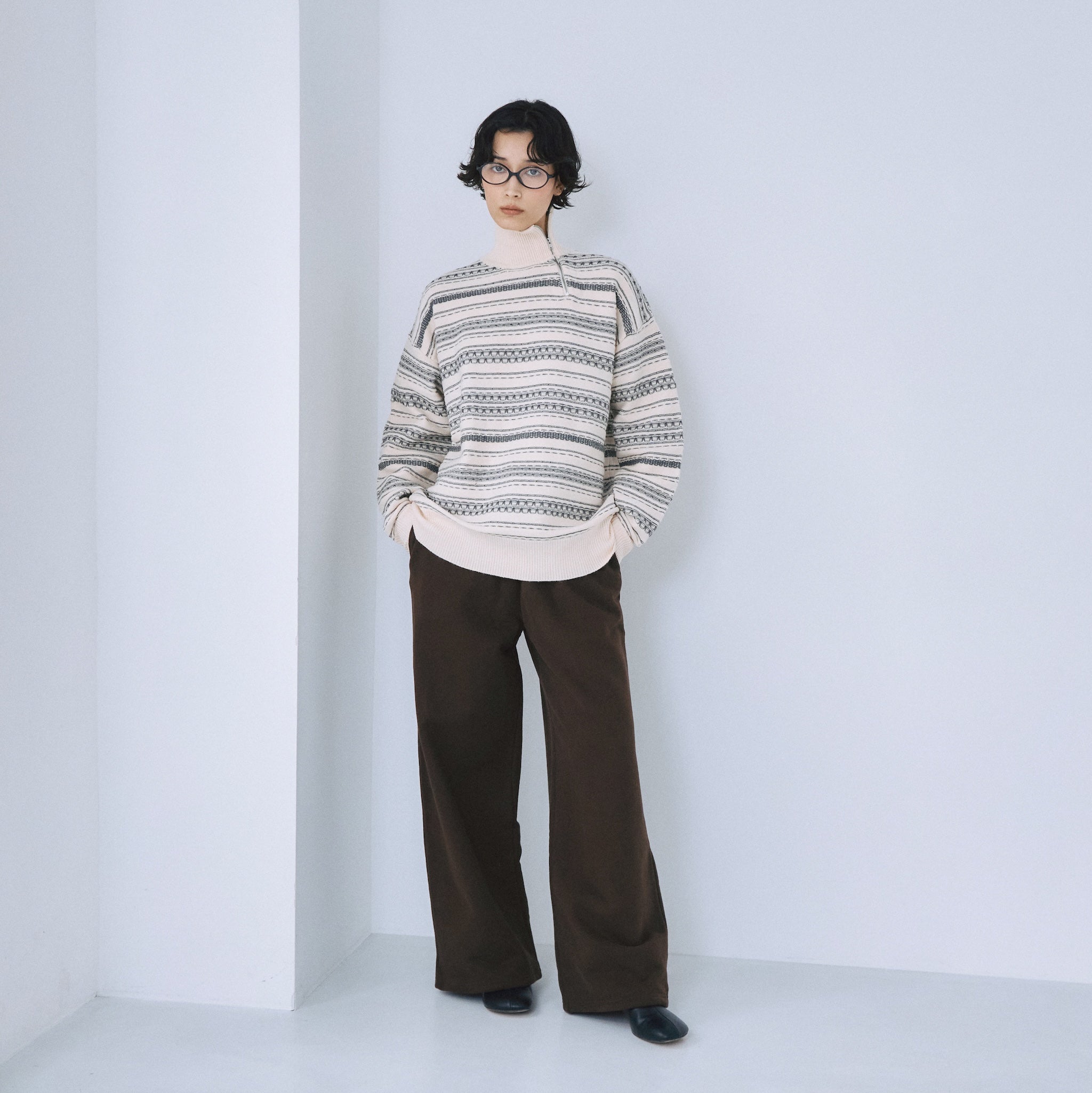 Jacquard knit zip high neck top