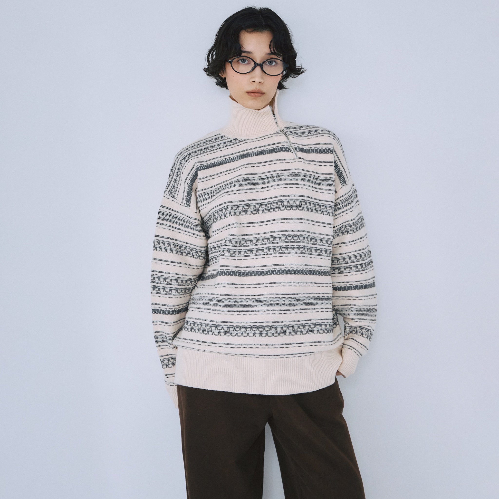 Jacquard knit zip high neck top