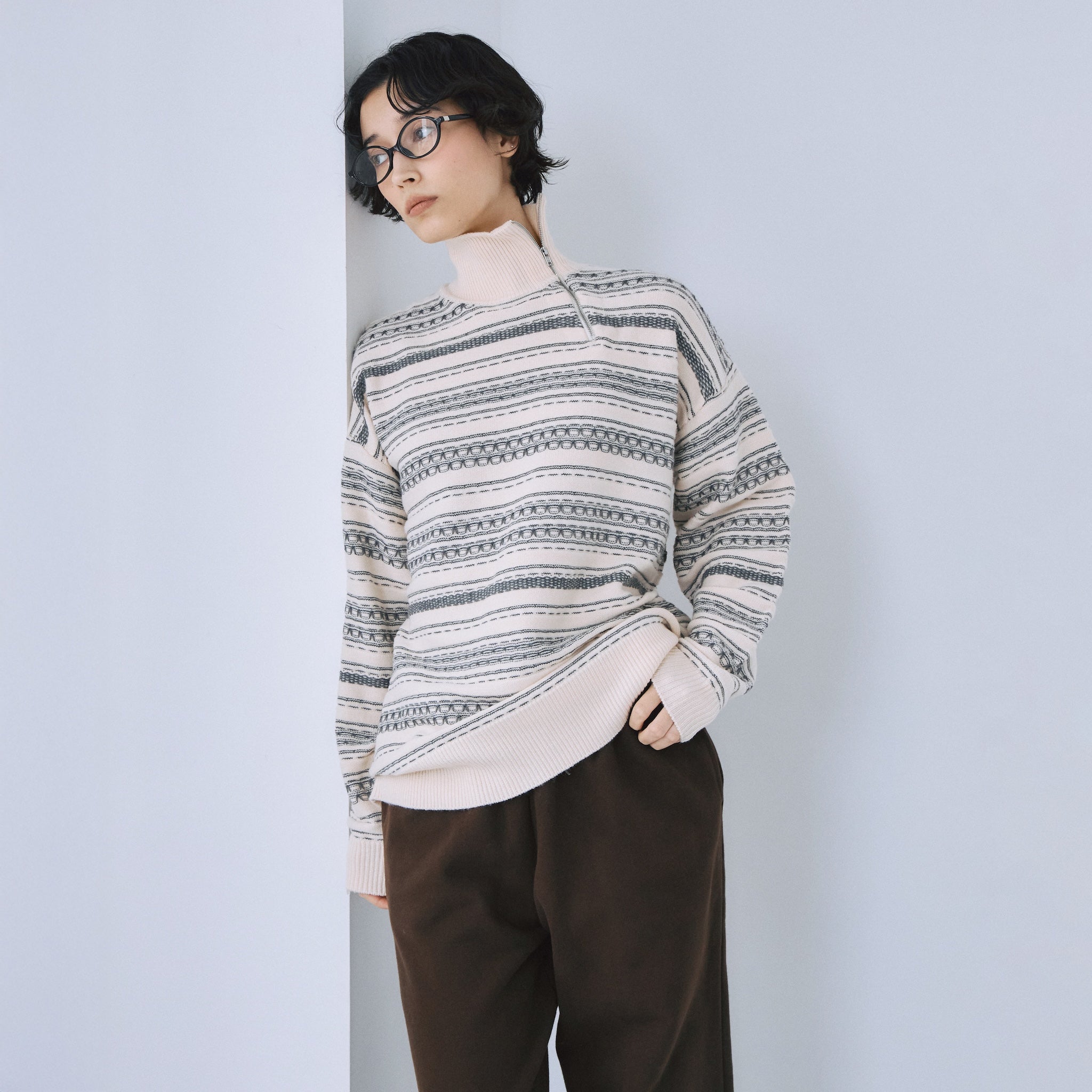 Jacquard knit zip high neck top