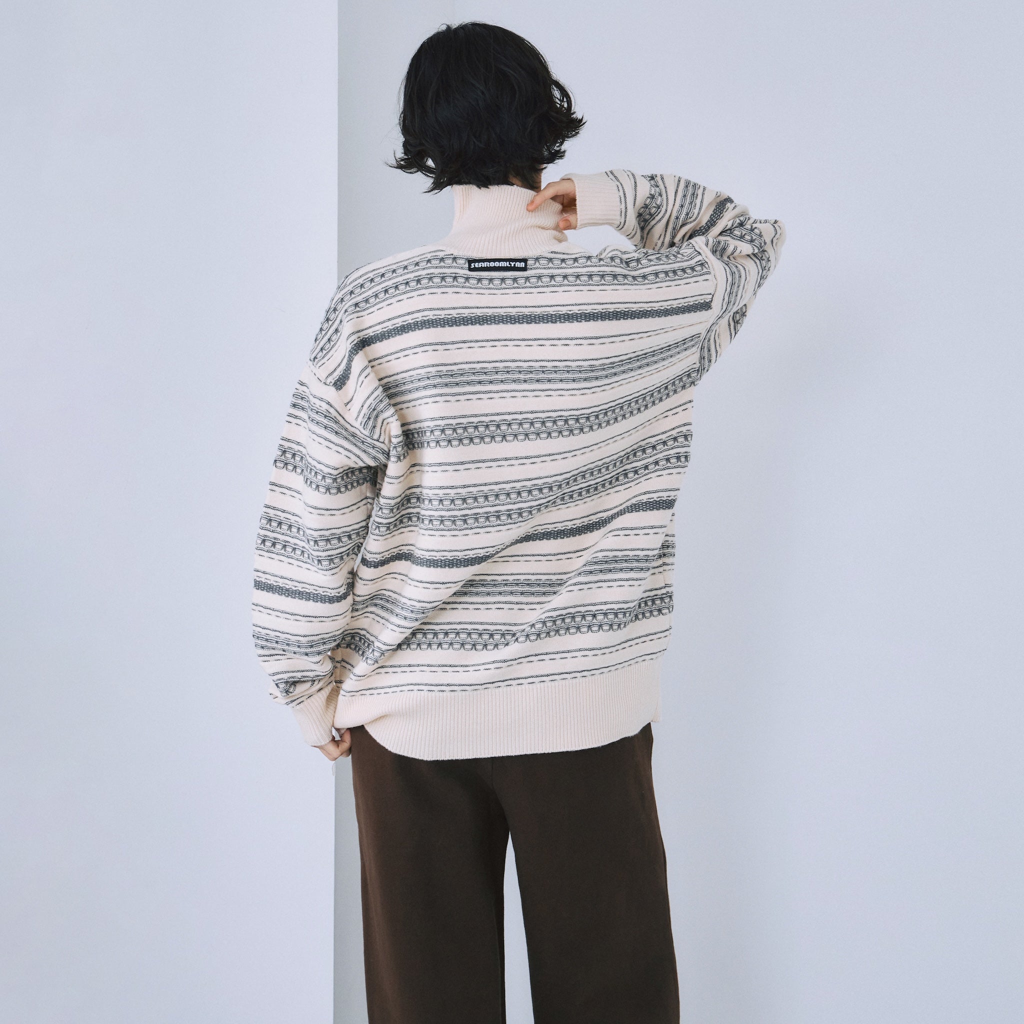 Jacquard knit zip high neck top