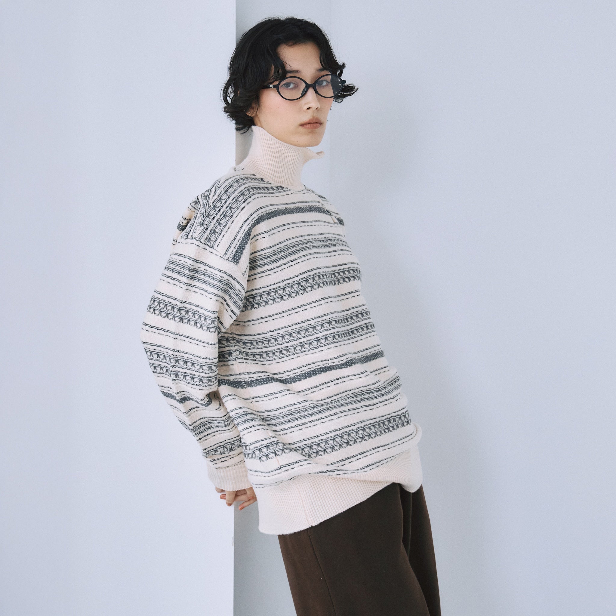 Jacquard knit zip high neck top