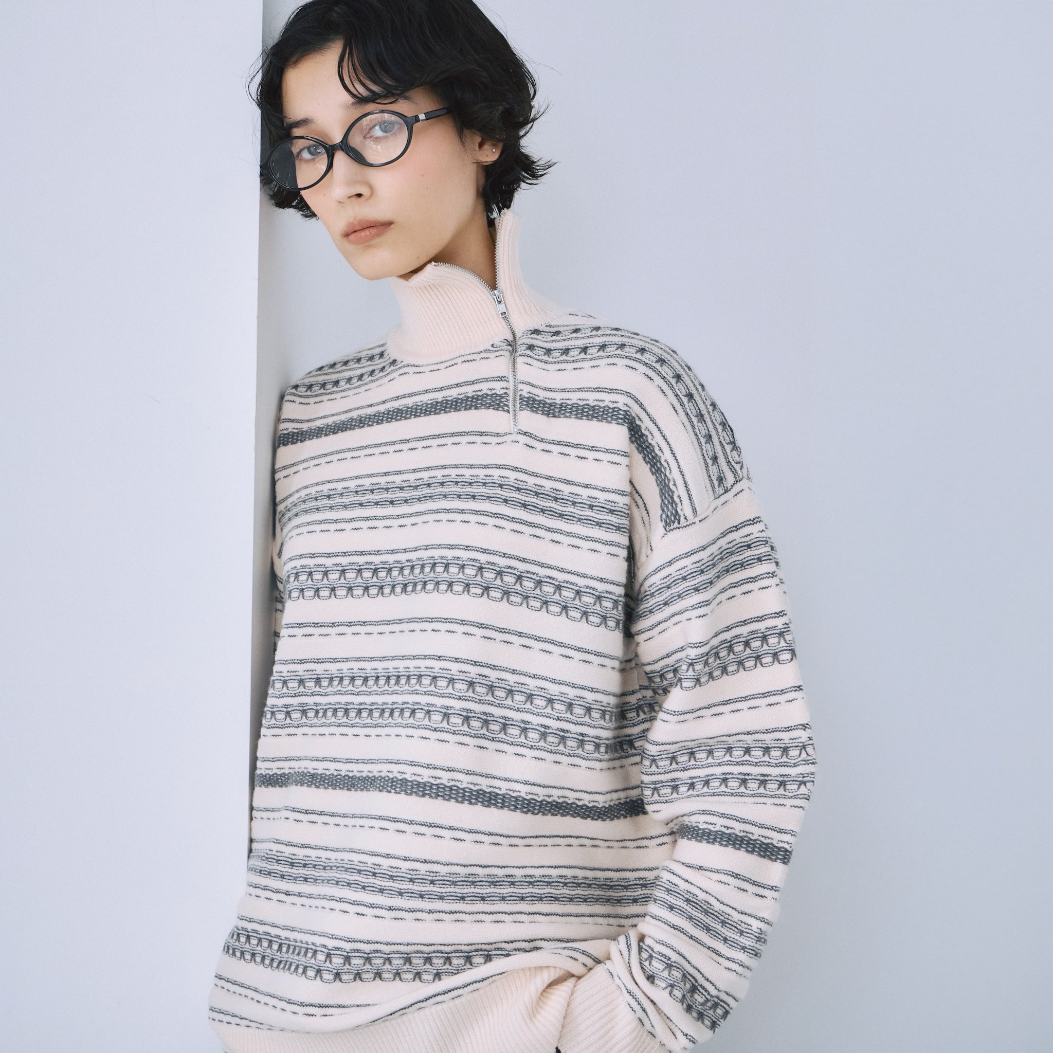 Jacquard knit zip high neck top