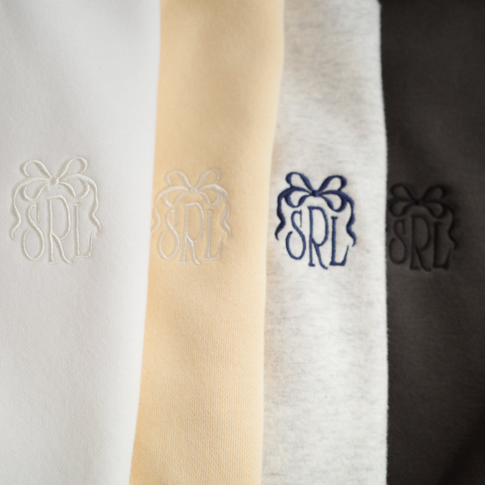 Ribbon Logo Volume Sweat Zip Top
